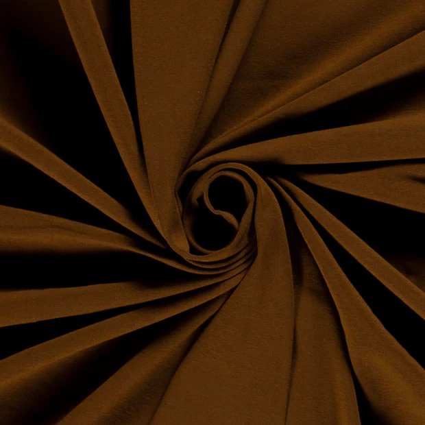 Uni Baumwolljersey Stoff in Braun als hochwertige Meterware für Nähprojekte.