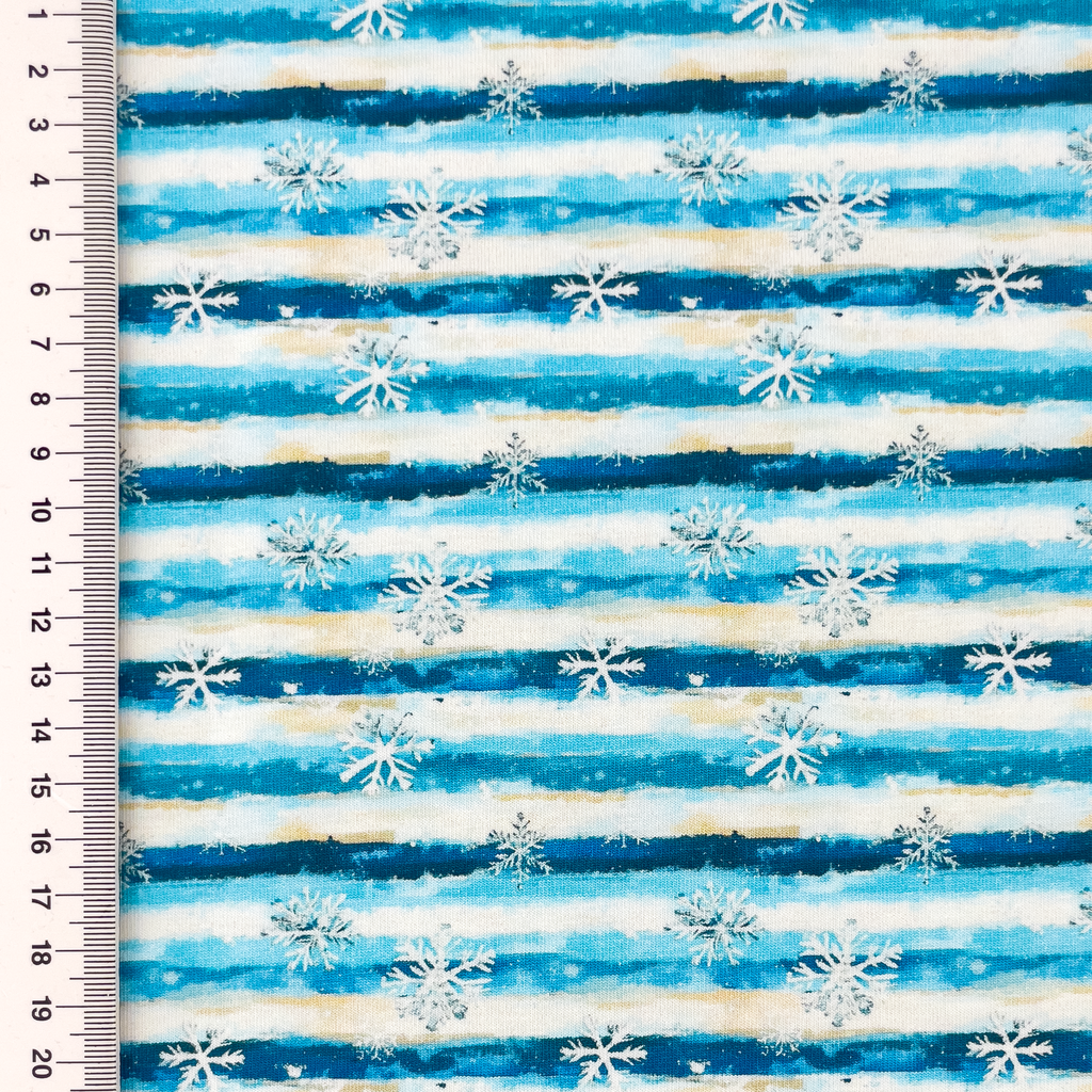 Hochwertiger Baumwolljersey mit winterlichem Schneeflocken- und Streifen-Design, 95% Baumwolle, 5% Elasthan, weiche Meterware für Winterprojekte