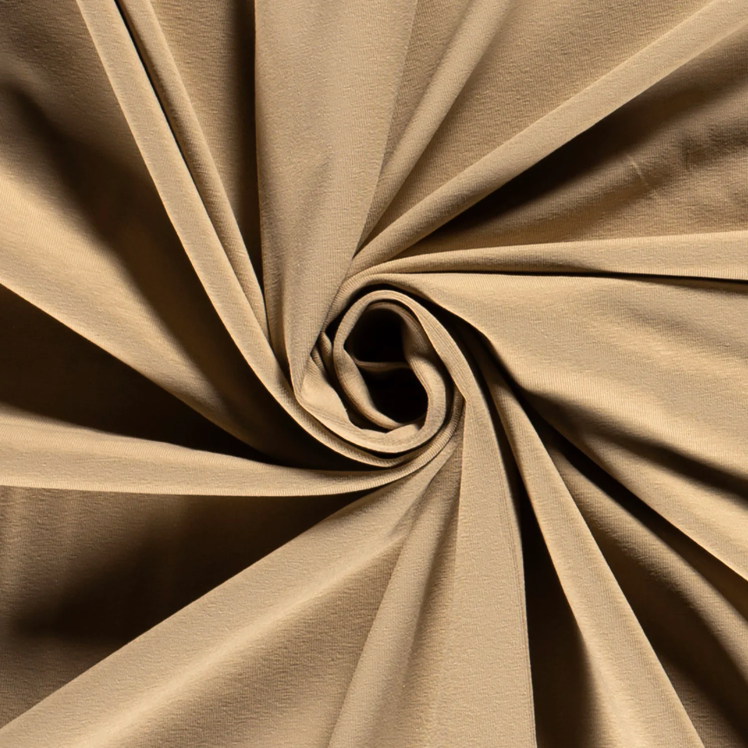 Uni Baumwolljersey Stoff in Beige als Meterware für Nähprojekte.