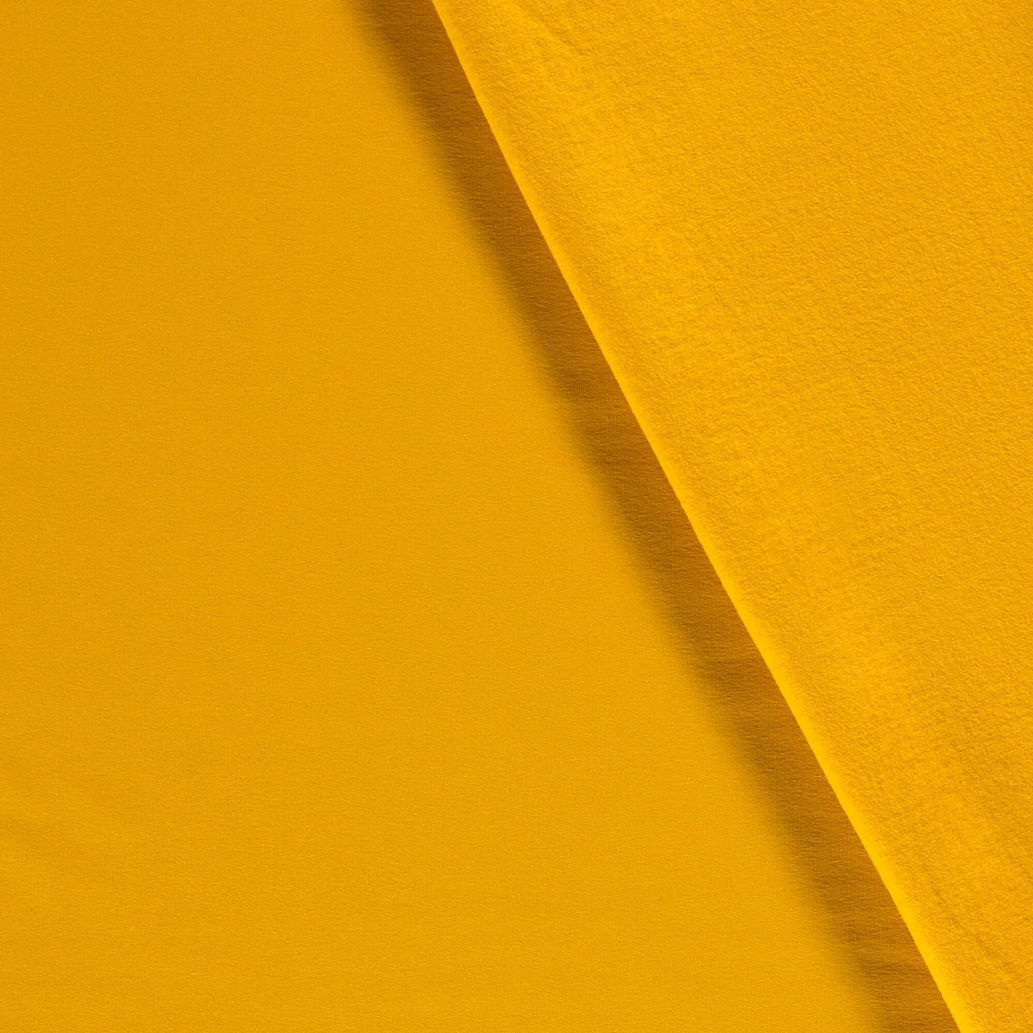 Sweat Stoff leicht angeraut Ocker Gelb Uni Meterware weich kuschelig