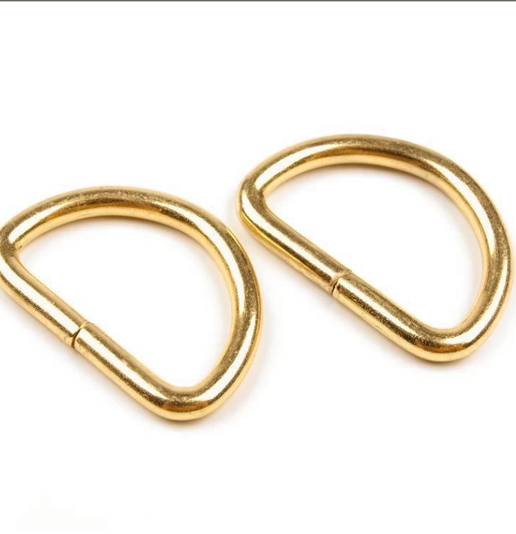 Eleganter Halbrundring (D-Ring) aus Metall in Gold für 25 mm breite Gurtbänder – Hochwertiges, glänzendes Verbindungselement für Handtaschen, Riemen und modische Accessoires.