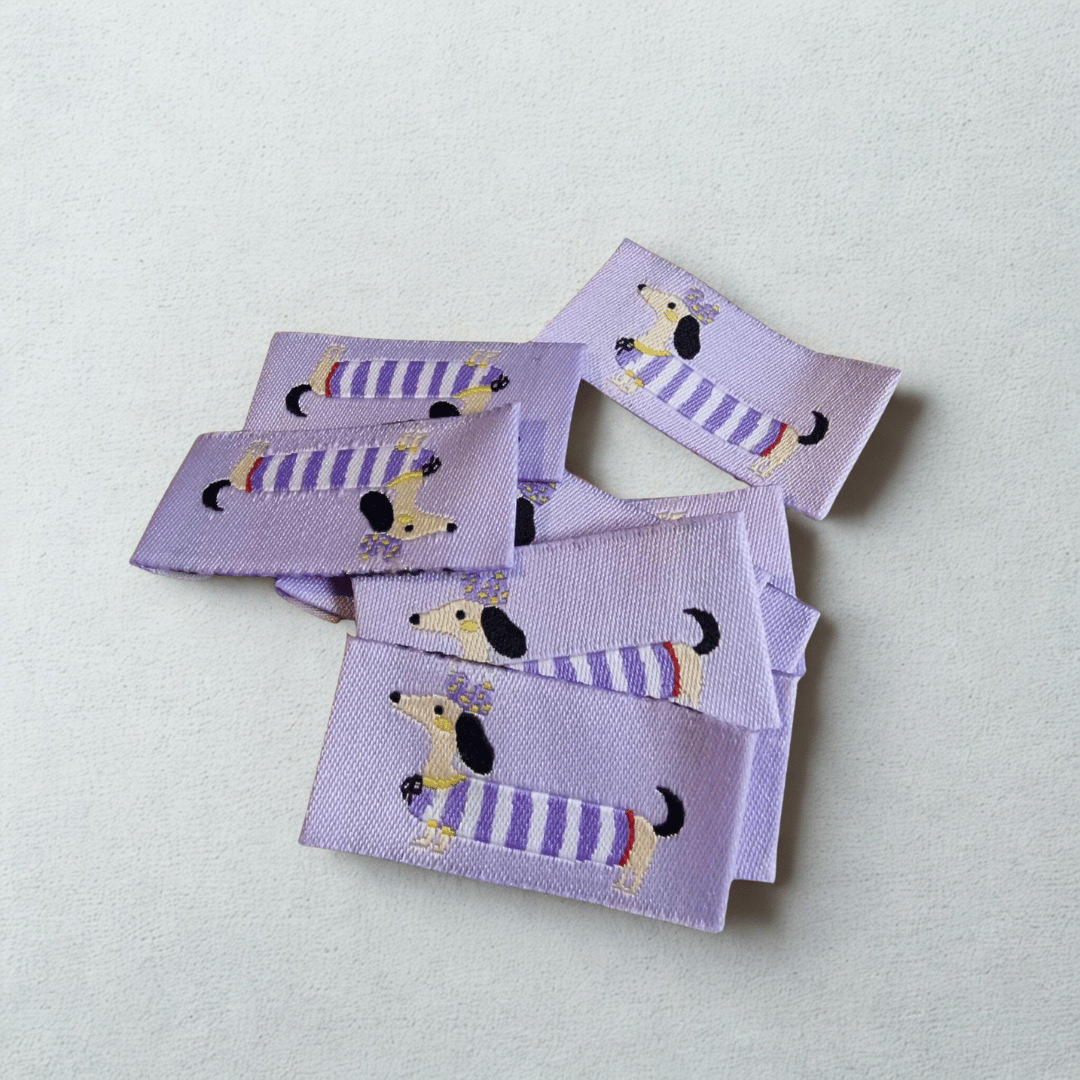 Webetiketten - 20mm x 40mm - Dackel - lila - 1 Stück