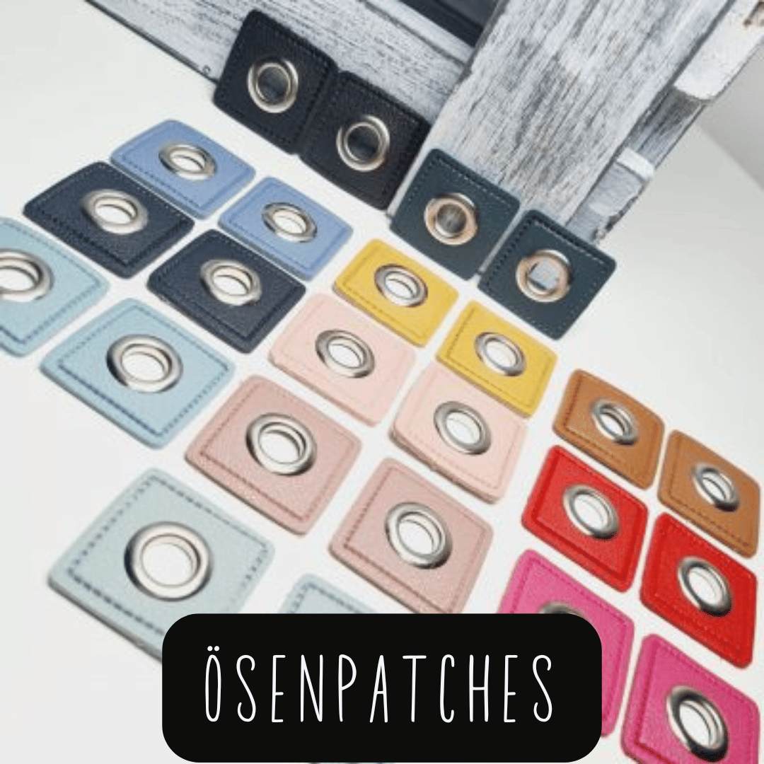 Quadratische Ösenpatches in verschiedenen Farben mit Metallösen, angeordnet auf weißem Untergrund