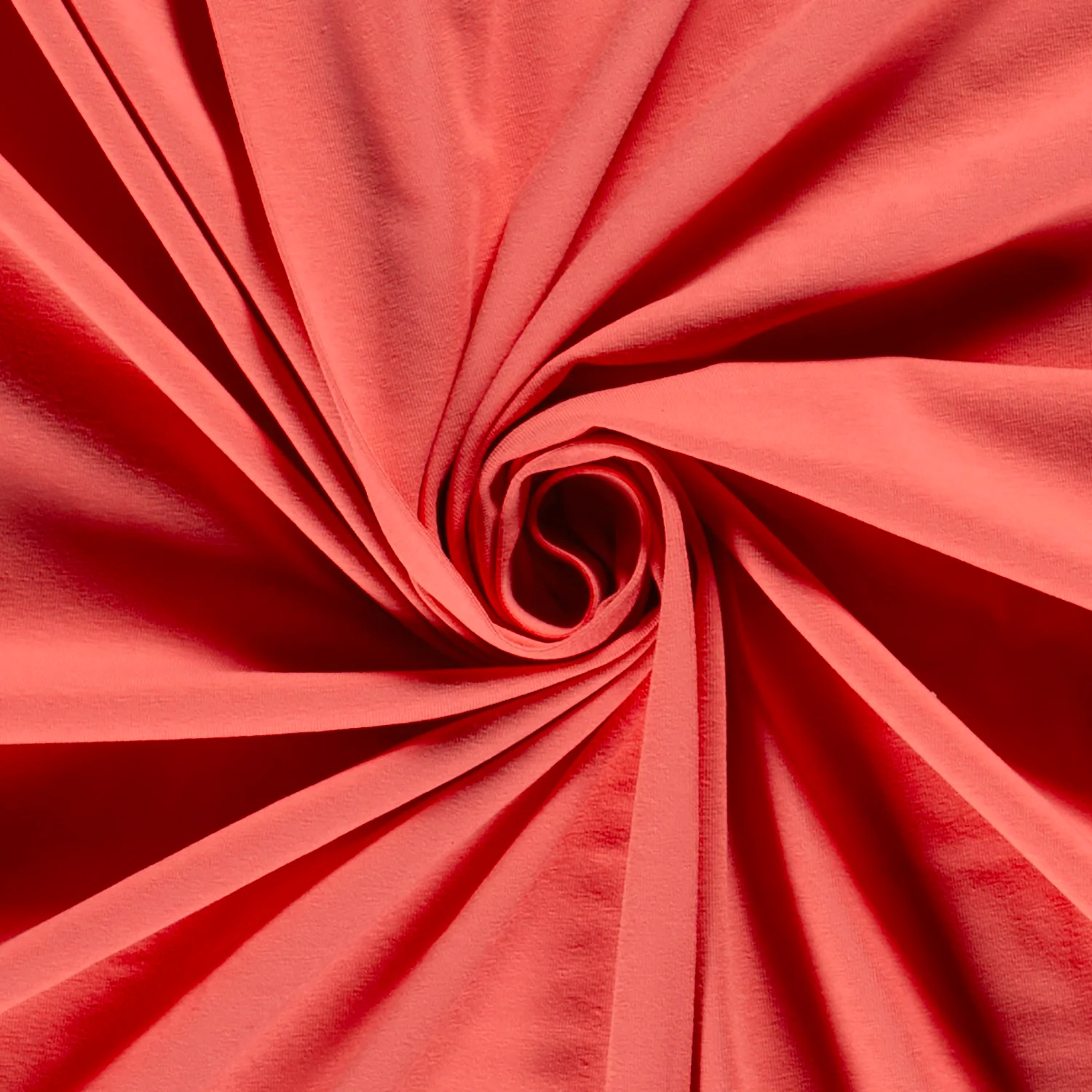 Uni Baumwolljersey Stoff in Koralle als hochwertige Meterware für Nähprojekte.